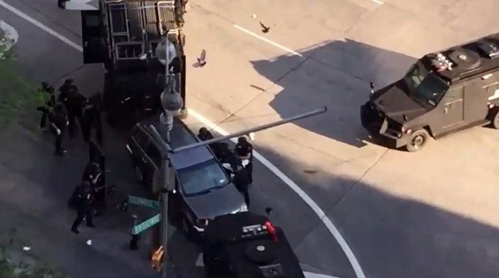 Standoff Suspect in Custody After Hoax Bomb Is Tossed Through Open Window of Police Vehicle