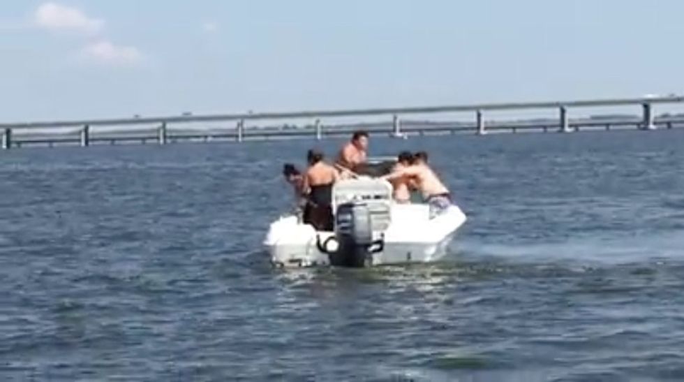 Witnesses Watch in Horror as Apparent Drunken Fight Breaks Out on Rental Boat in the Middle of Sailboat Race