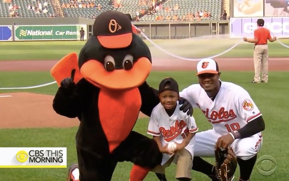 9-Year-Old Who Received the First Bilateral Hand Transplant Tosses Out First Pitch at Baltimore Orioles Game