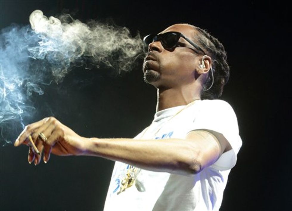 Dozens Injured After Railing Collapses at Snoop Dogg, Wiz Khalifa Concert