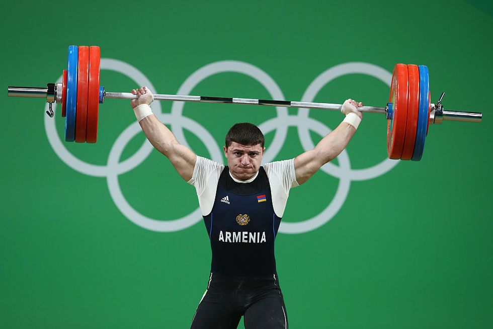 Armenian Weightlifter Suffers Shocking Elbow Injury During Summer Olympics Competition