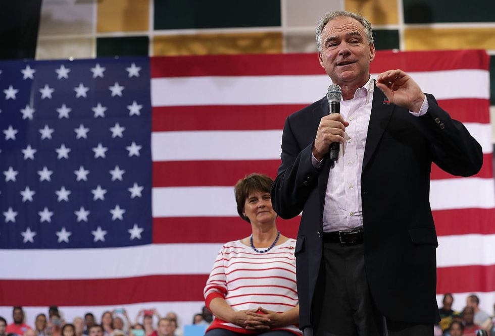 Tim Kaine Plays Harmonica With Band Performing 'Wagon Wheel' at Brewery in North Carolina
