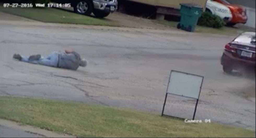 Terrifying Footage Shows Texas Car Thief Dragging Owner Down the Street