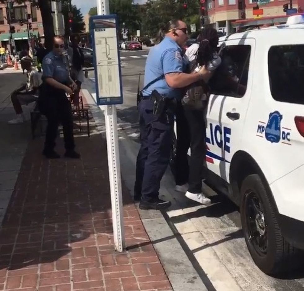 Black Woman Speaks Out After Video Shows White Officer Lifting Her, Pinning Her Against Police Vehicle