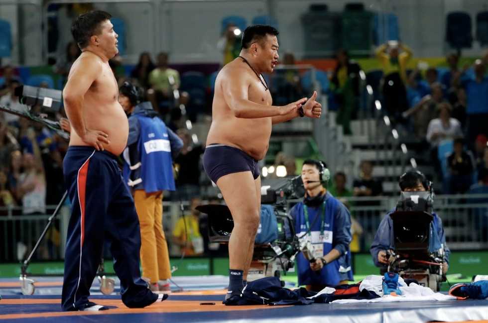 Mongolian Coaches Protest Their Olympic Wrestler's Gut-Wrenching Loss by...Stripping Off Their Clothes