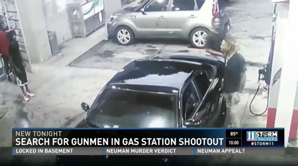 Surveillance Video: Woman Finds Herself in Middle of Two Gunmen in Gas Station Shootout