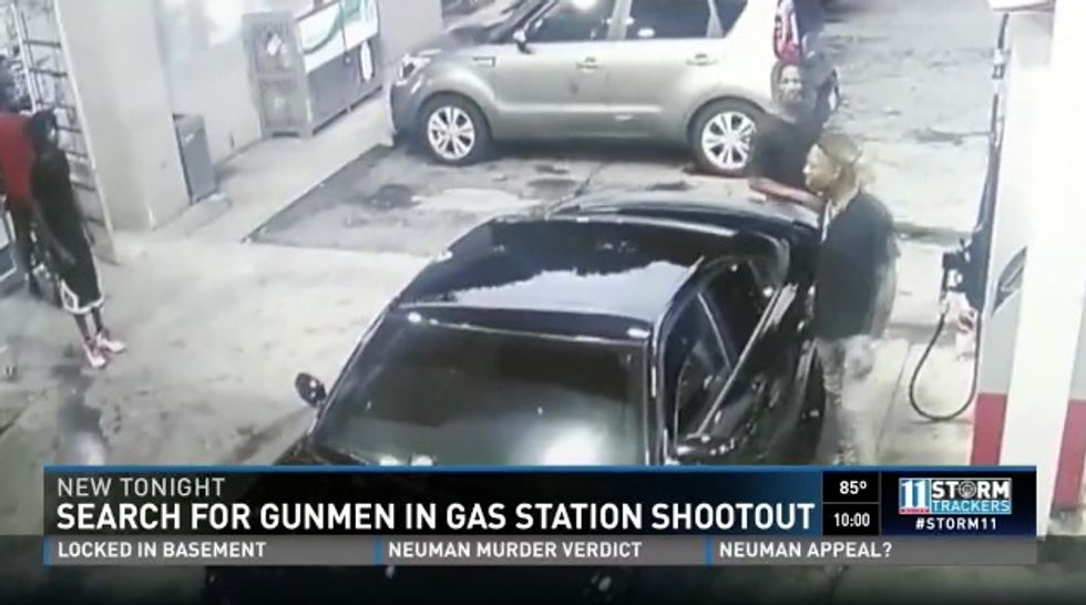 Surveillance Video: Woman Finds Herself in Middle of Two Gunmen in Gas Station Shootout