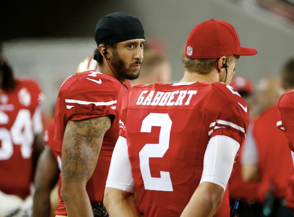 A Protest Isn't Disrespect': NFL Players Weigh in on 49ers QB Kaepernick Refusing to Stand for National Anthem