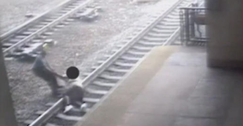 Harrowing Footage Shows Moment Transit Cop Pulls Man Who 'Want[ed] to Die' From Train Tracks