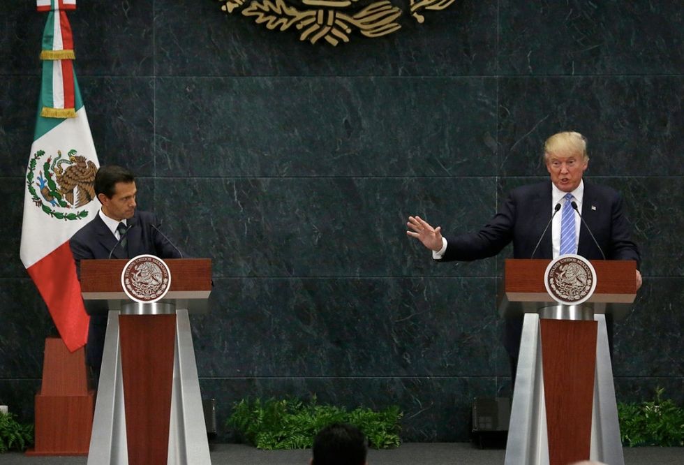 Who Pays for the Wall? Dispute Clouds Trump's Mexico Visit