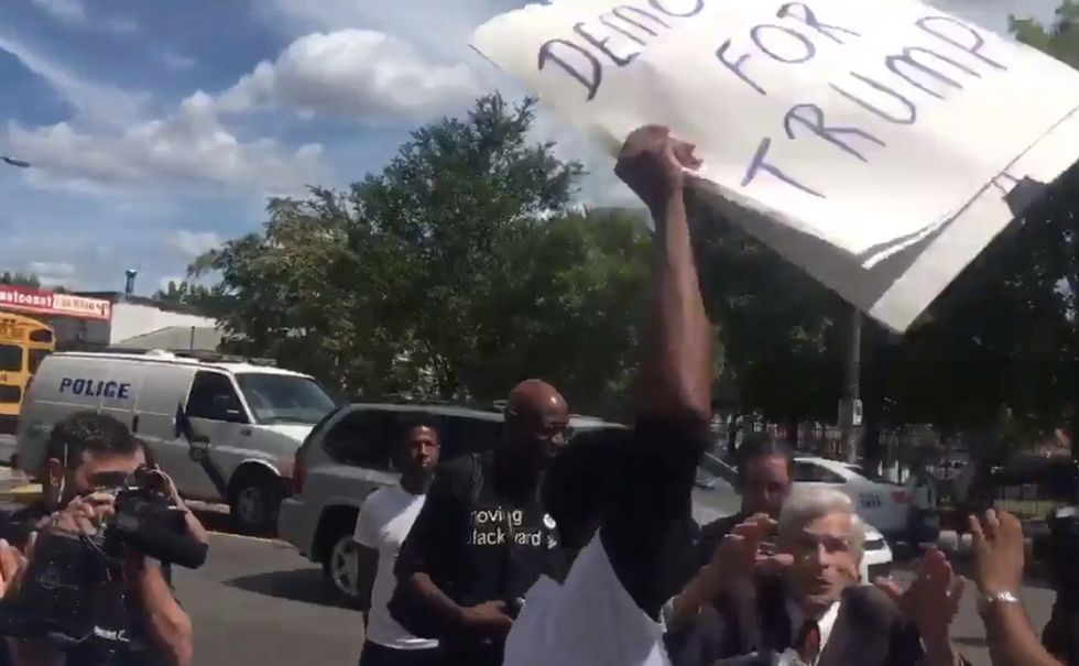 Black Lives Matter Protester Doesn't Take Kindly to 71-Year-Old Holding Pro-Trump Sign During Nominee's Philly Visit