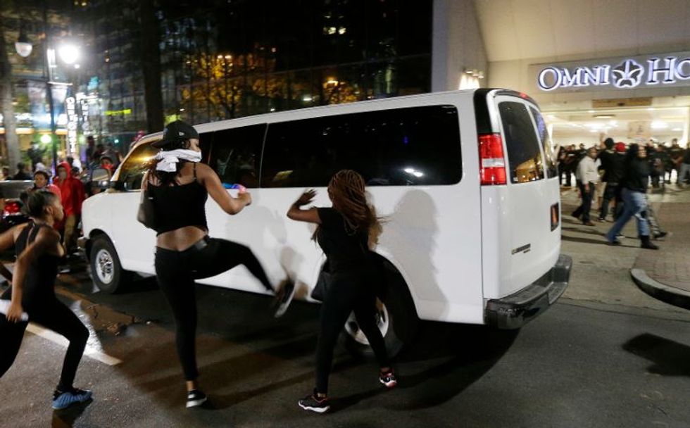 Charlotte workers asked to stay home after night of violence