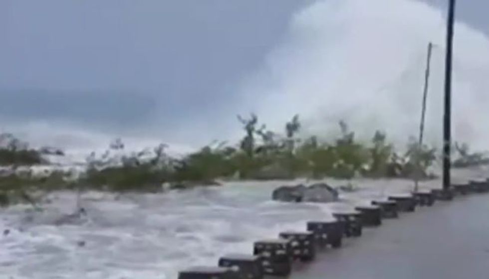 Hurricane Matthew's 145-mph winds roar into impoverished Haiti