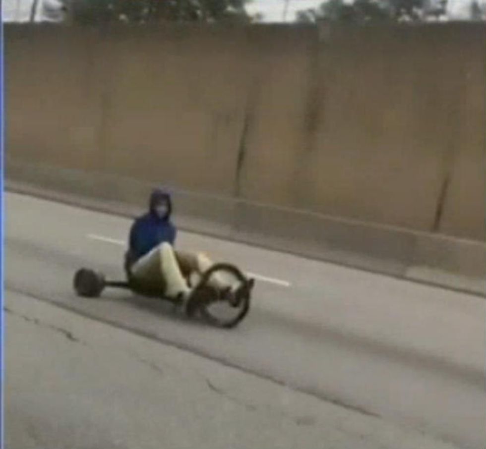 Smiling man caught on video riding big wheel on busy Philly highway. But motorists don't share his glee.
