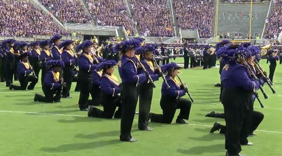 After marching band members take knee during national anthem, college issues declaration