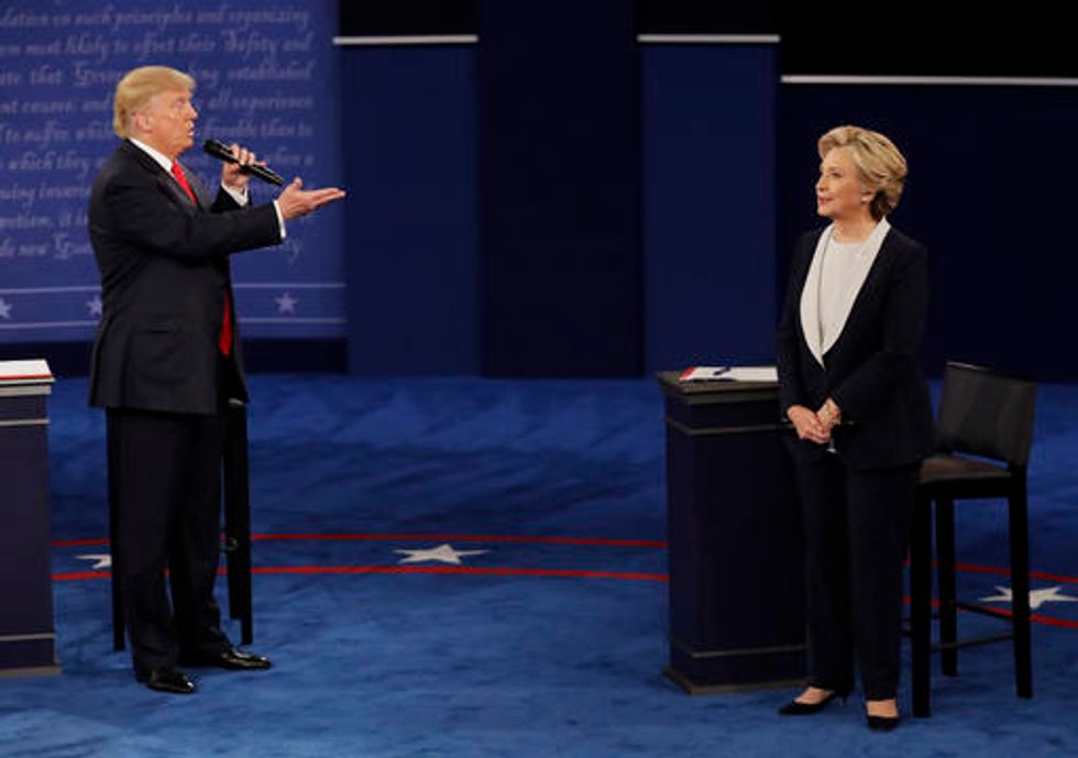 Trump's hot-mic moment overshadows debate