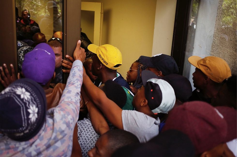 S. African protesters demanding free college education throw human feces to disrupt classes