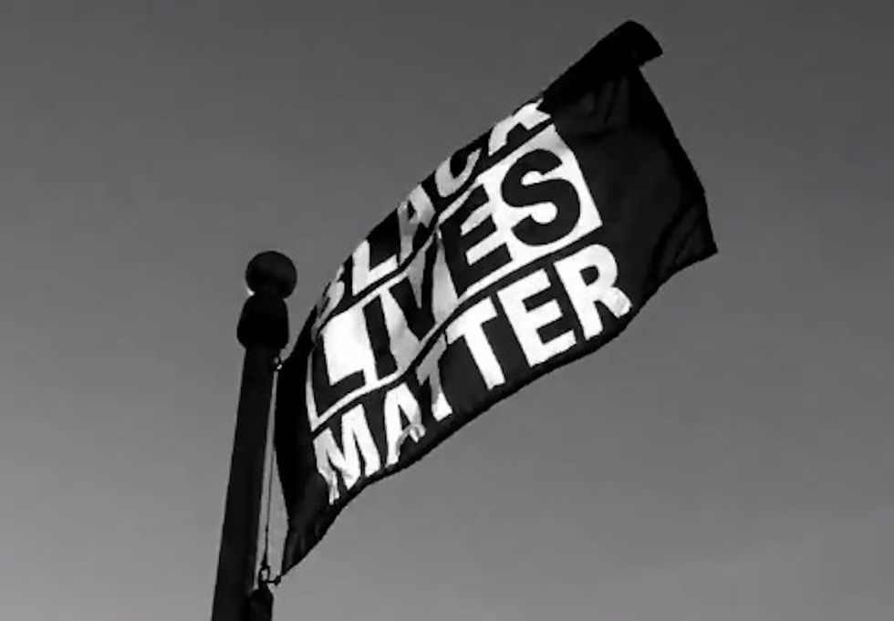 Black Lives Matter flag raised on campus quad. Here's how school administrators react.