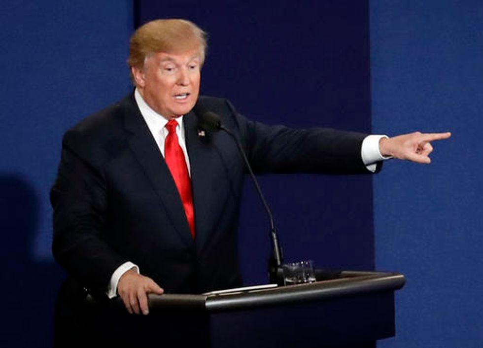 After a barb about his taxes, Trump calls Clinton 'such a nasty woman