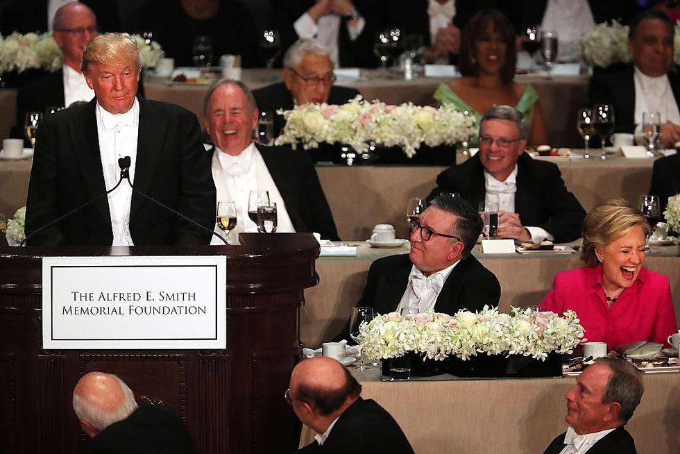 Trump draws intense boos for saying Clinton 'hates Catholics' during New York charity dinner