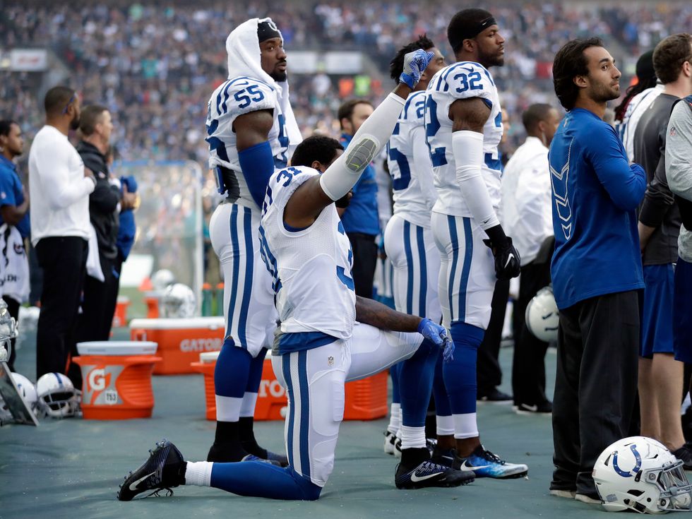 Wife of NFL cornerback says her husband was cut over national anthem protest