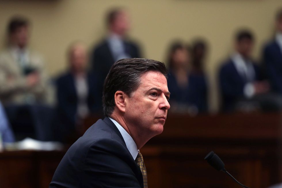 FBI's Comey was against accusing Russia of interfering in the election, source says