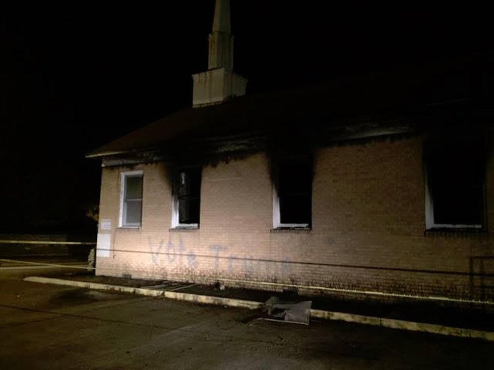 Vandals leave behind political message after torching black Mississippi church