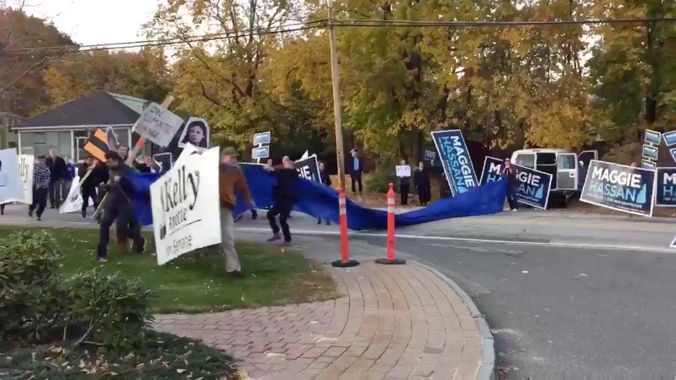 Supporters of Dem Senate candidate try to block Ayotte crowd from entering New Hampshire debate hall