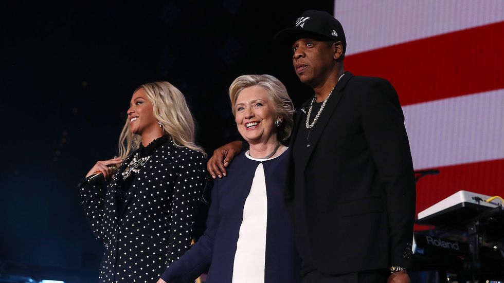 Rapper Jay Z performed expletive-laced songs during Clinton rally in Cleveland