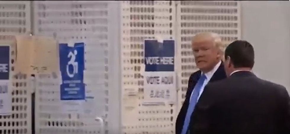 Watch: Donald Trump loudly booed as he arrives to cast his vote