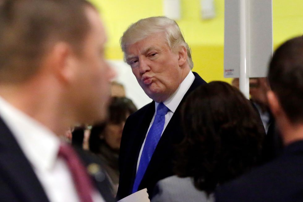 Topless female protesters hauled out of Trump's NYC polling location by Secret Service