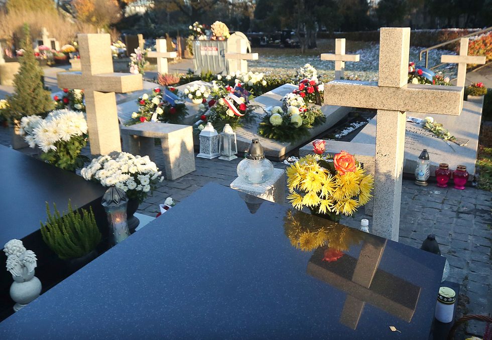 Poland exhumes late president Kaczynski's body amid allegations he was assassinated by Russia