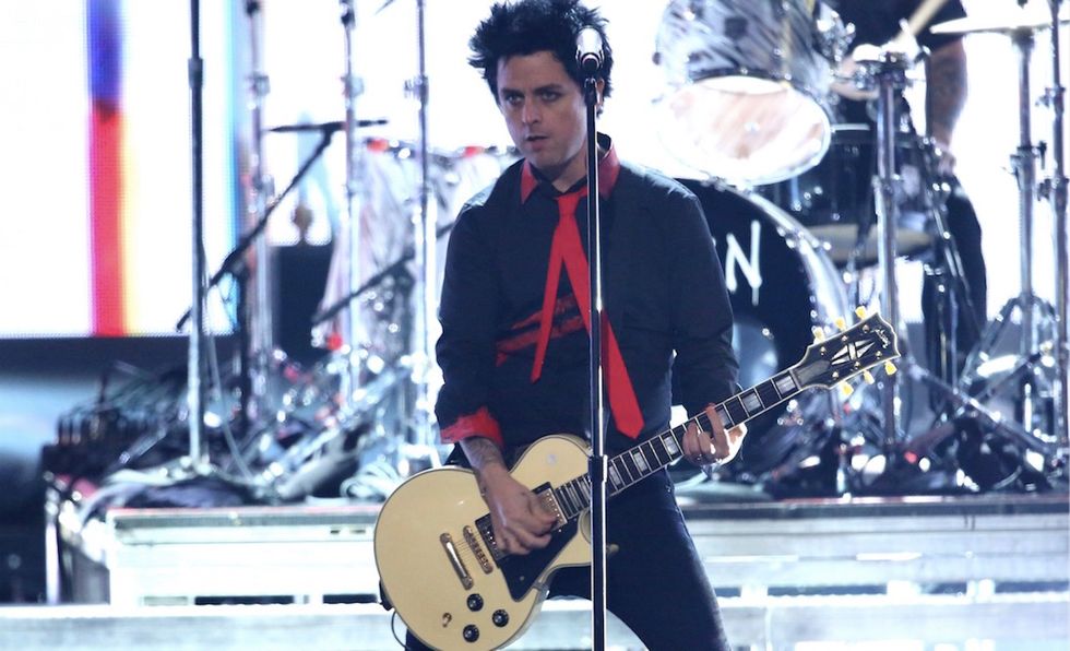 No Trump! No KKK! No fascist USA!': Green Day chant leads Trump skewering at AMAs