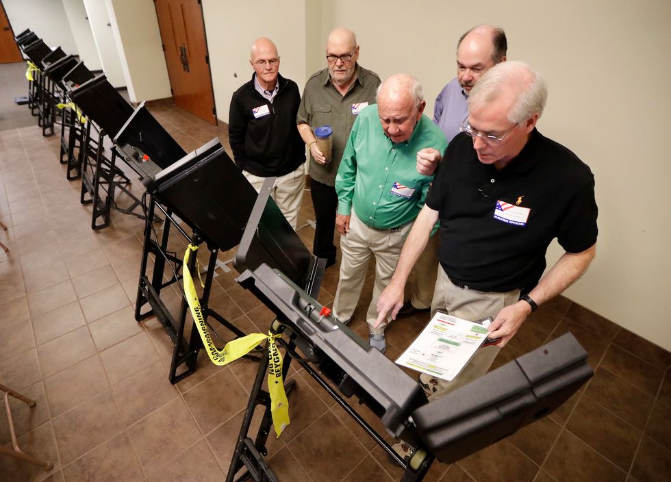 Group seeks to overturn voting results in three states on the basis of unfounded Russian hacking claims