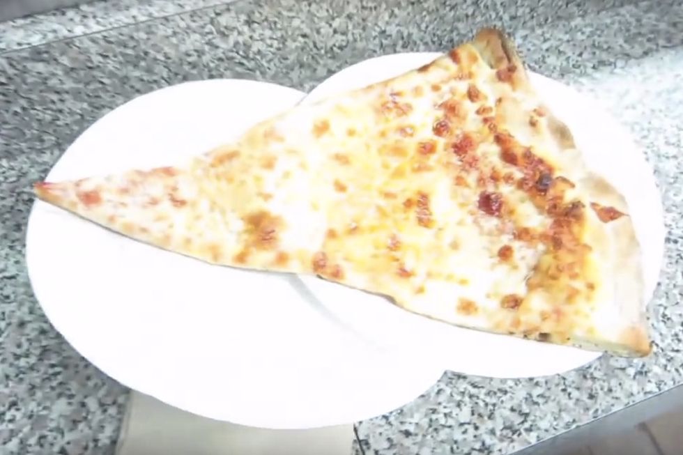Police: Woman uses pizza slice as ID to enter college town bar, gets nasty when bouncer says no