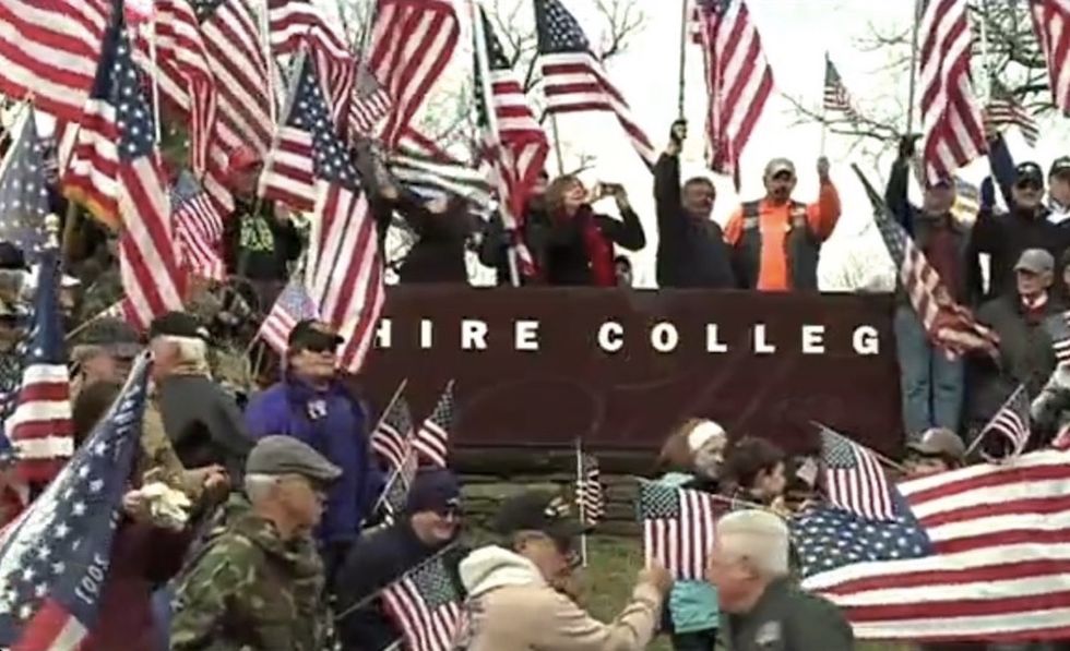 At least 1,000 veterans descend upon college to protest American flag removal
