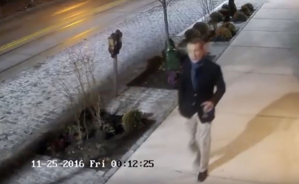 Wine glass-clutching city attorney identified in 'F*** Trump' graffiti surveillance video