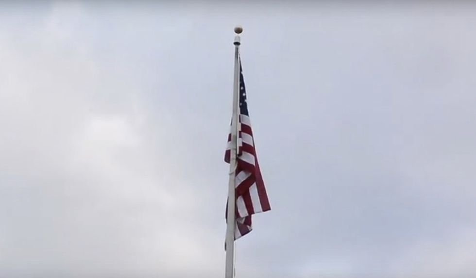 American flag raised again at Hampshire College after nationwide outrage over its removal