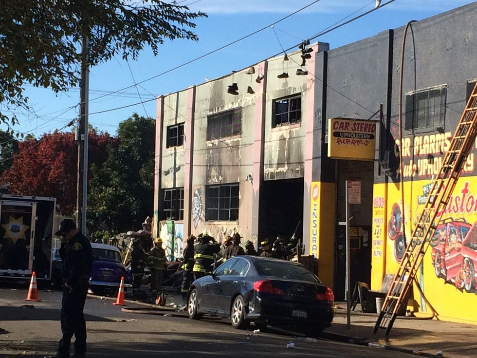 At least 9 people dead, dozens more feared dead after massive warehouse fire in Oakland