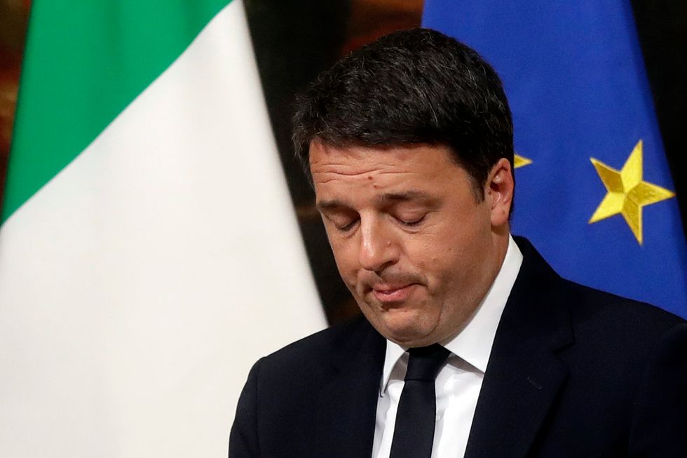 Liberal Italian PM resigns after populist victory in historic referendum