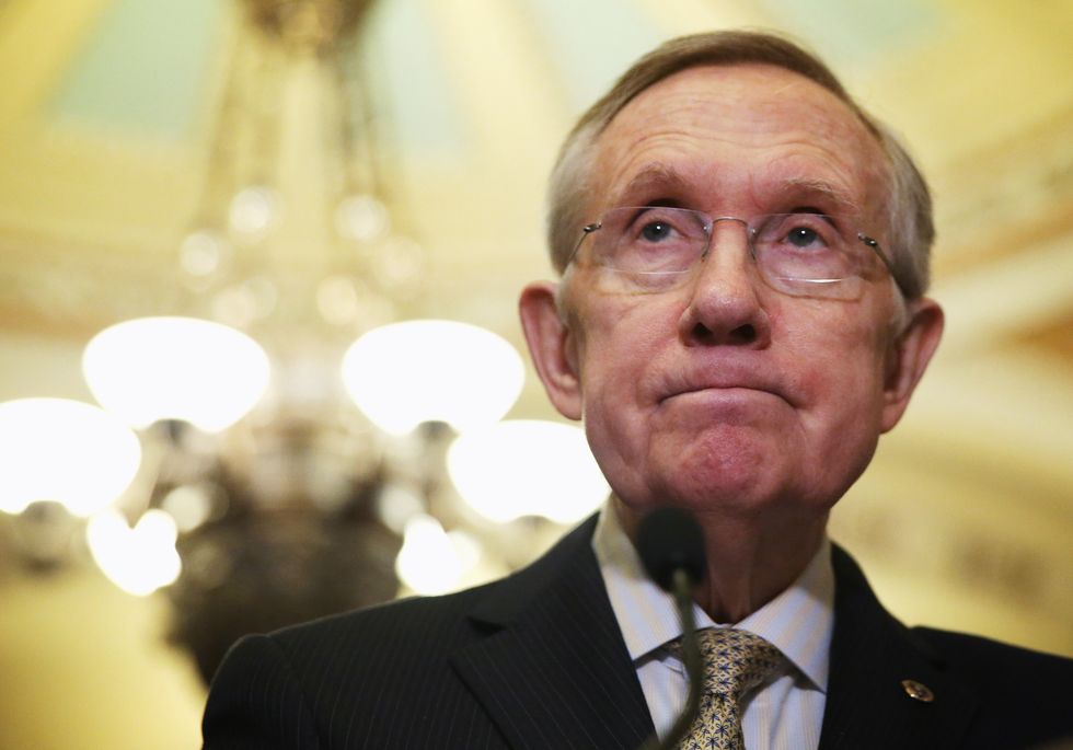 Harry Reid calls on FBI Director Comey to resign over CIA Russian hacking report