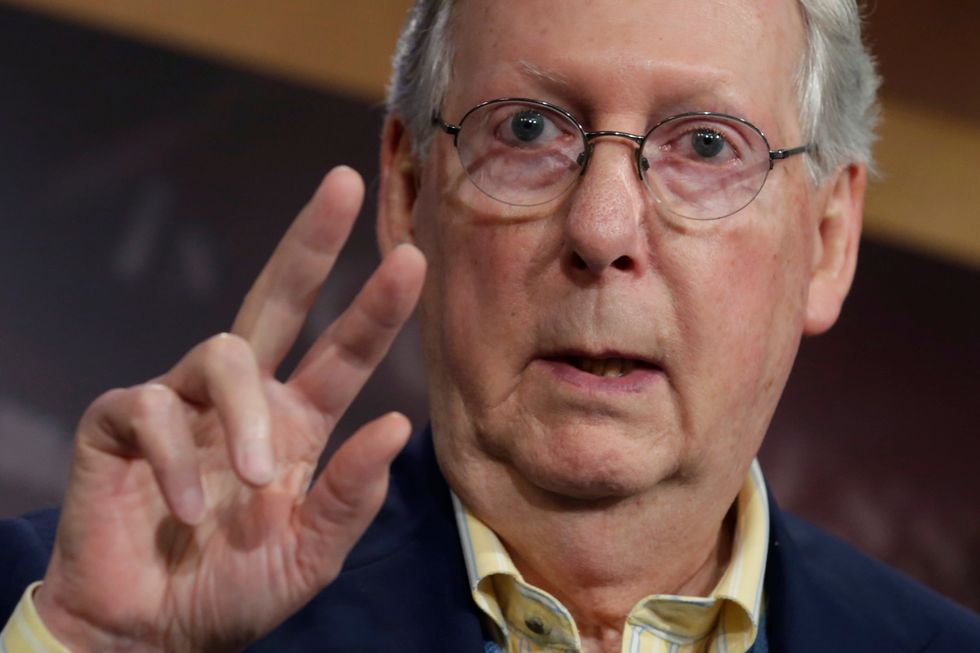 Mitch McConnell defies Trump on investigation into Russian tampering