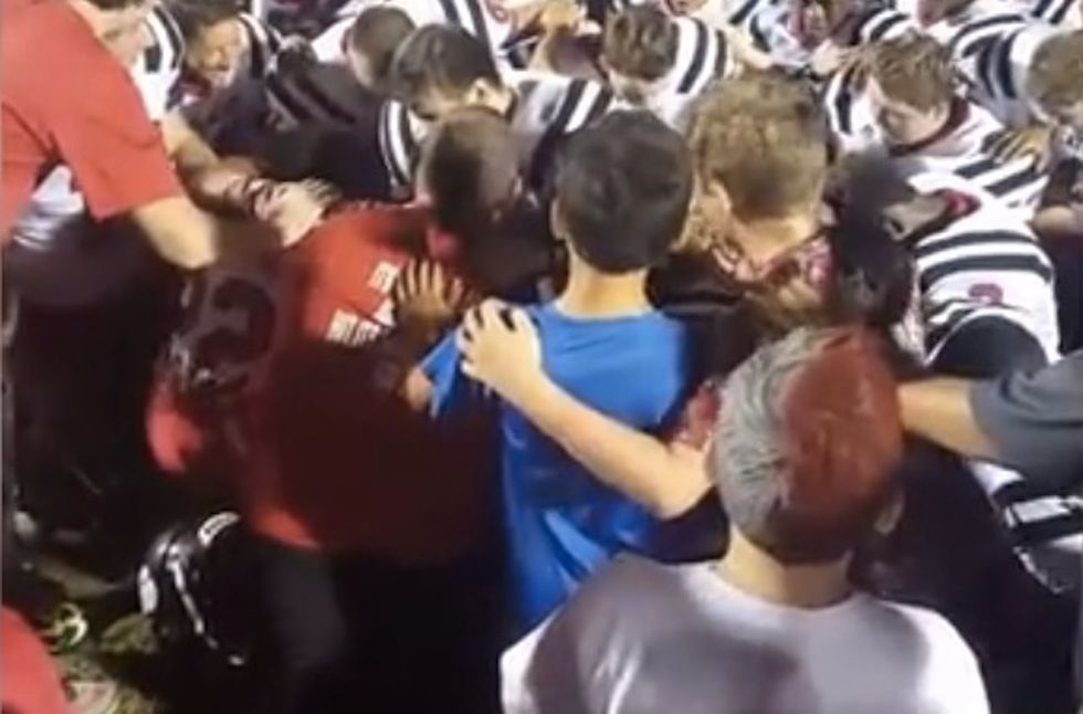 As coaches freely kneel with teams against anthem, one ripped for kneeling with squad—during prayer