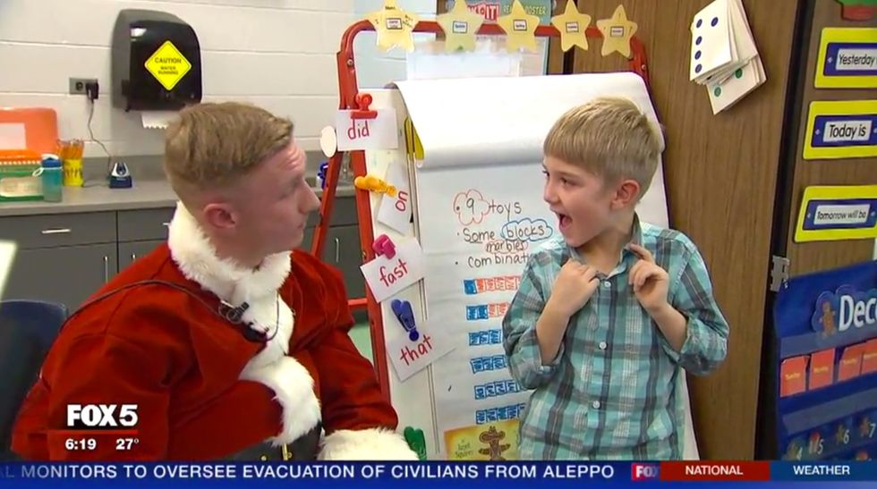 Watch: Marine disguised as Santa surprises son at school following long deployment