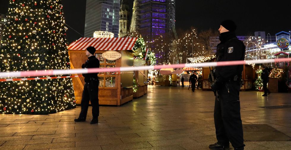 Truck plows into Berlin Christmas market, killing nine, injuring dozens