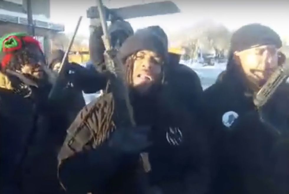 Free us or you die, cracker!': Armed black panthers march against police 'genocide