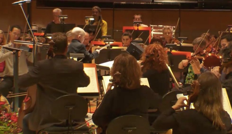 7-year-old fighting leukemia fulfills his dream of conducting an orchestra