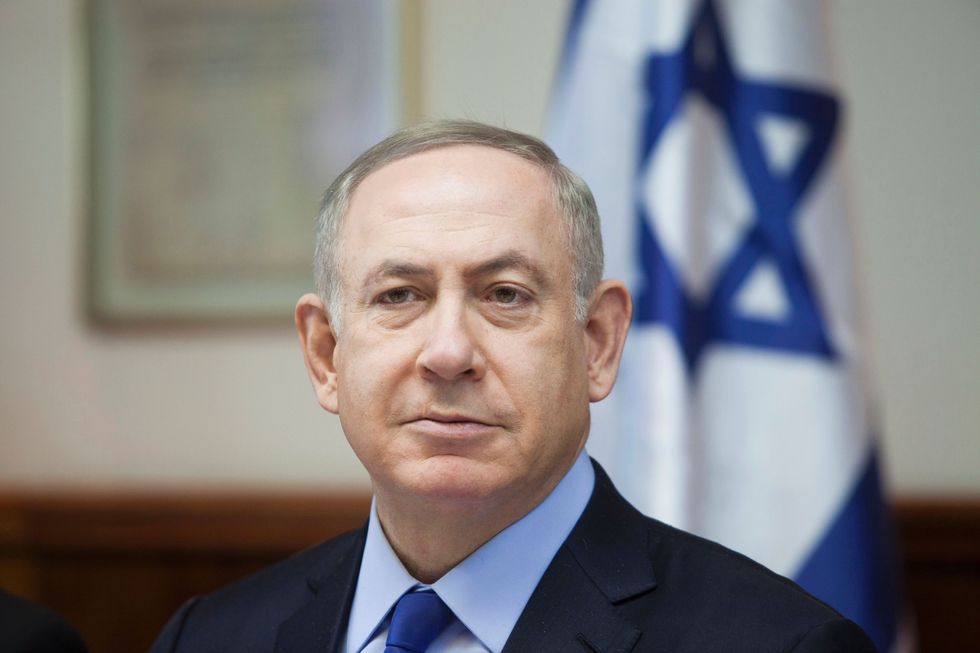 Israel plans to continue building settlements in East Jerusalem, defying anti-Israel U.N. resolution
