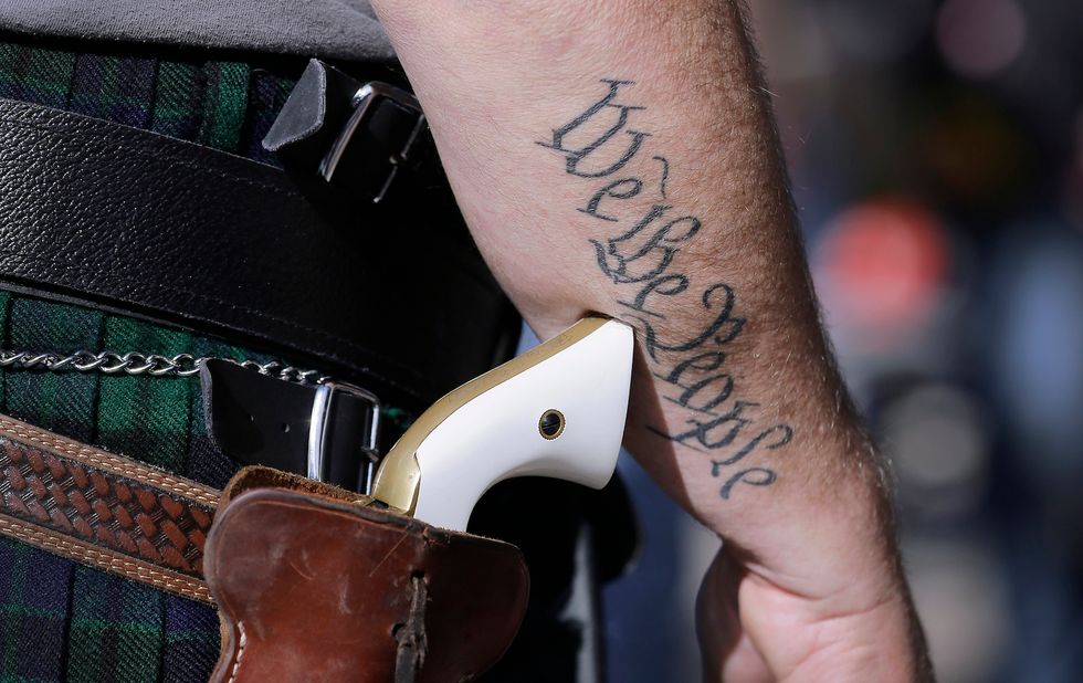 Two men attempt to rob a gun store, and the story ends how you would expect