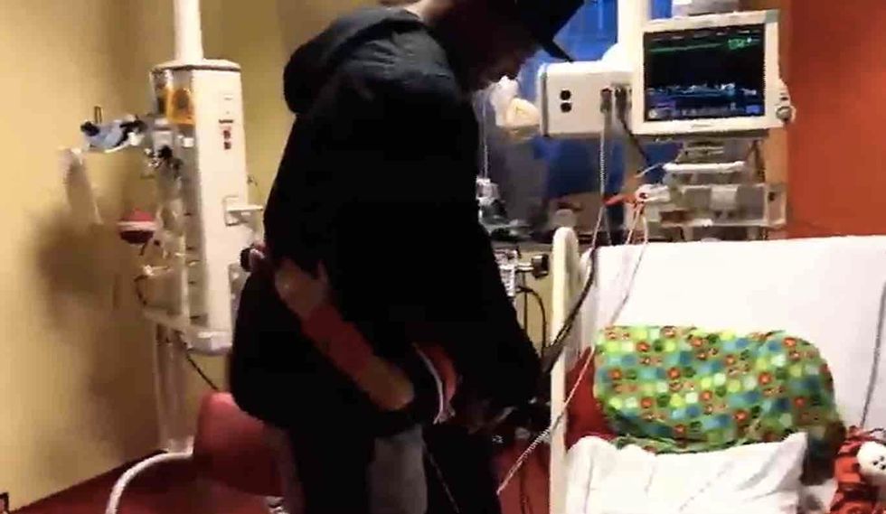 NFL star grants Christmas wish to boy with heart condition. The child's reaction is tear-jerking.